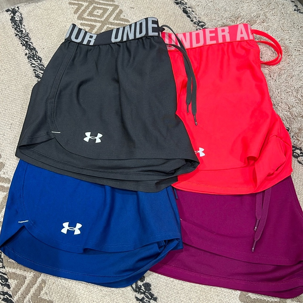 4 Pairs of UA Shorts